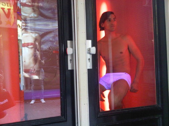 Male prostitute in Amsterdam's Red Light District