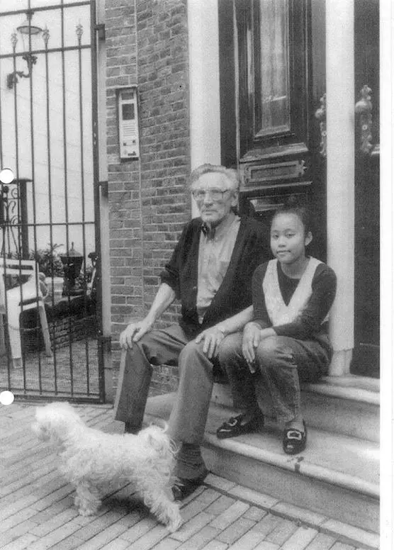 Former kingpin Frits van de Wereld of Amsterdam's Red Light District, sitting in front of house which is now Hofje van Wijs. 
