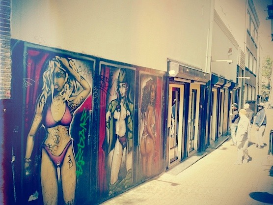 20 Amazing Pictures of Amsterdam's Red Light District: Street Art and Window Shoppers