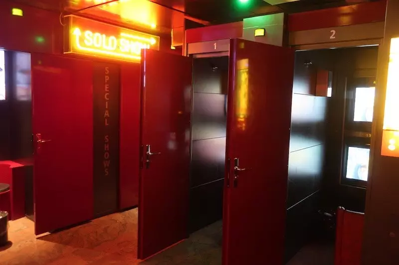Corridor of video and solo booths inside the Amsterdam peep show Sex Palace