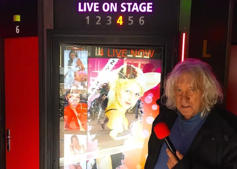The late Jan van Otten, founder of the Otten Group, at the Sex Palace peep show in Amsterdam's Red Light District