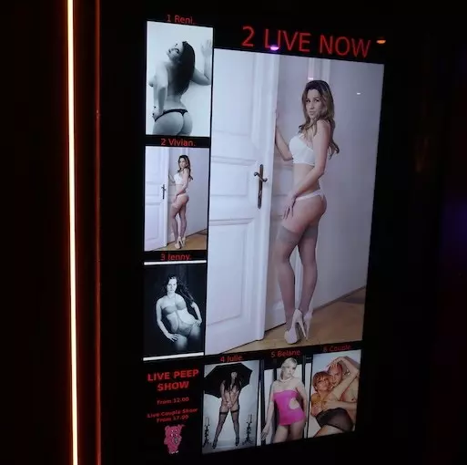 Amsterdam peep show live-show board advertising 2 Live Now performers at Sex Palace