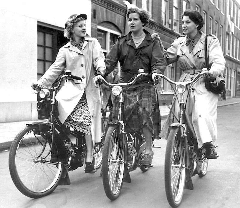 Young women on Mobylettes in Holland