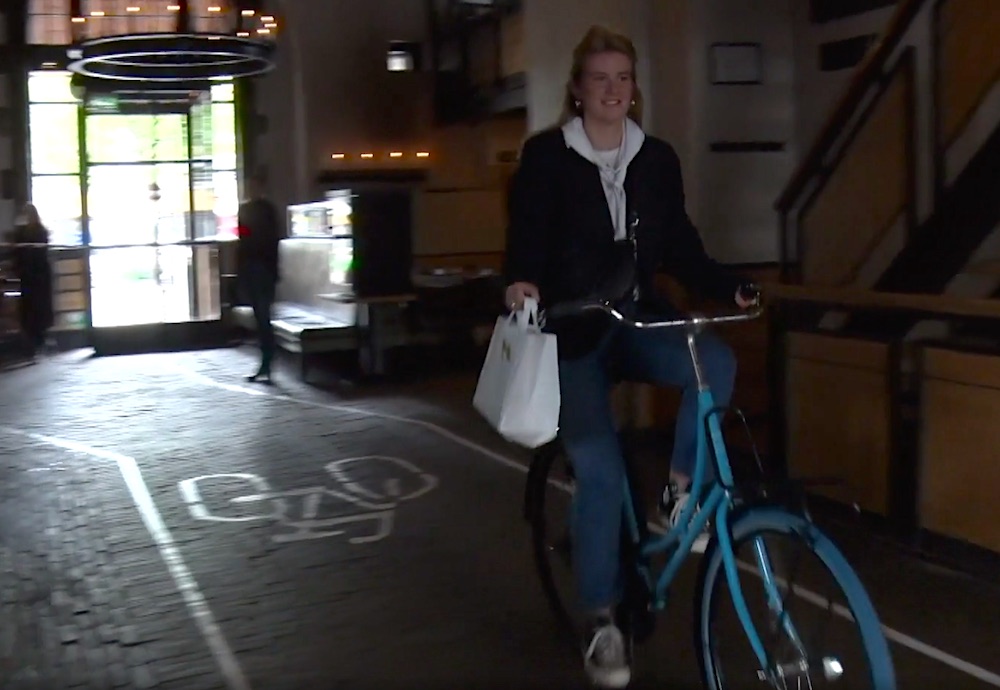bike through restaurant in de waag Amsterdam 