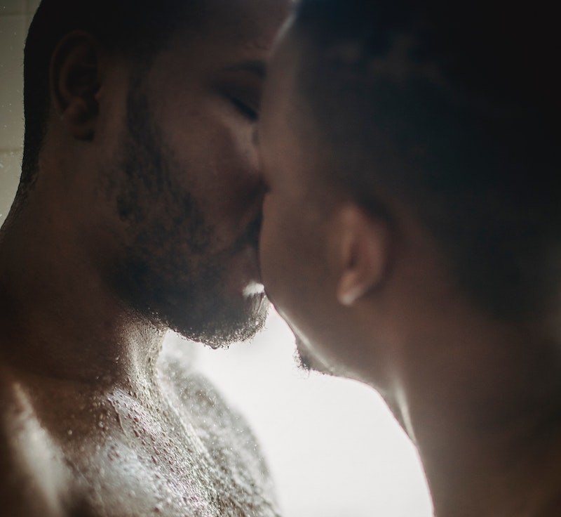 two black men kissing each other
