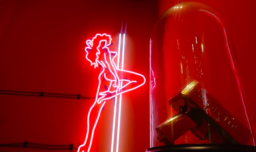 red neon light of a stripper