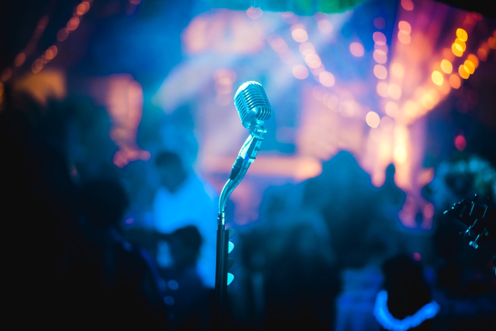 a microphone in a karaoke bar at night