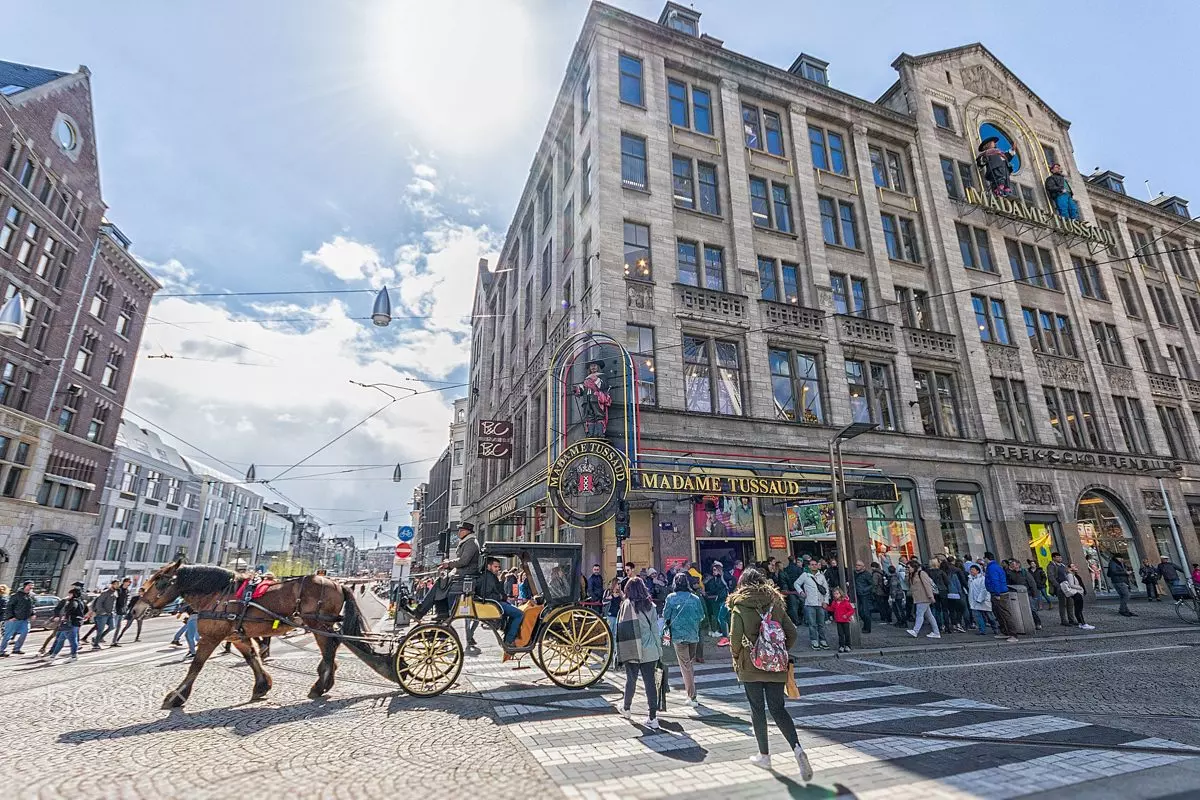 Visitors queuing outside Madame Tussauds Amsterdam on Dam Square